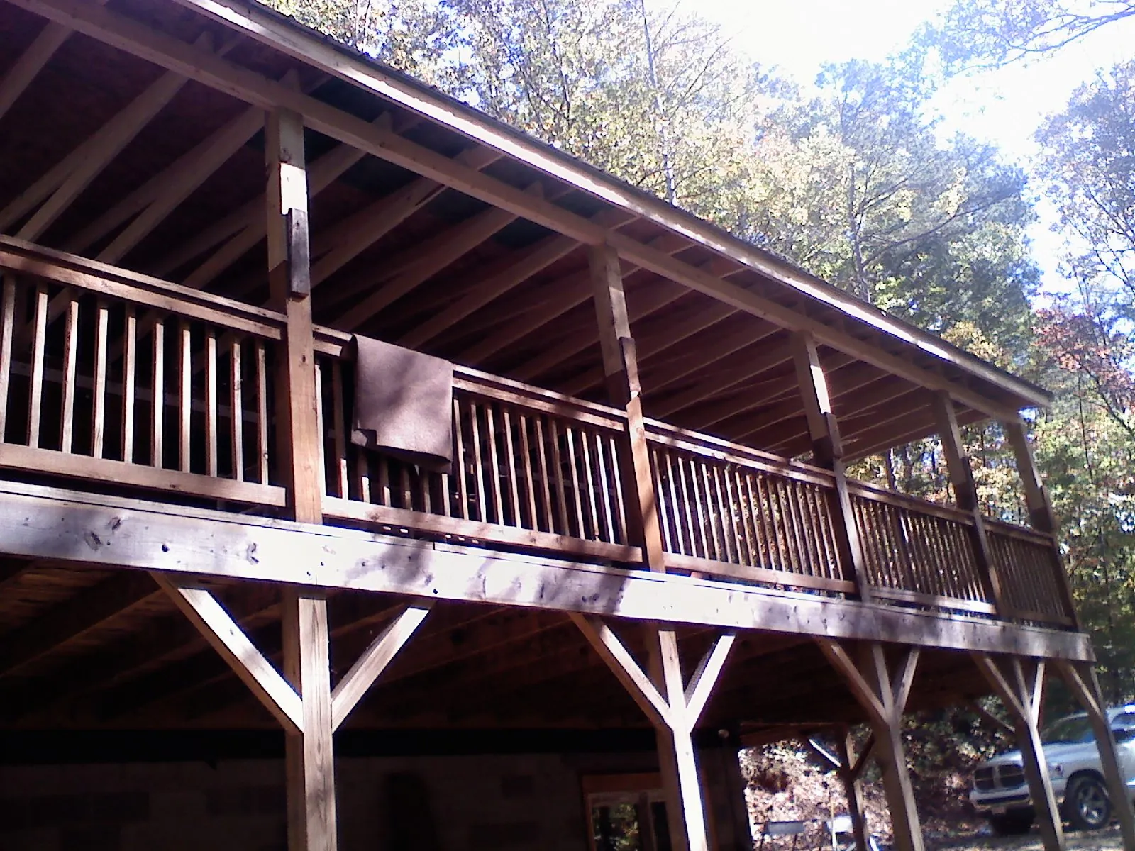 Timber framing under a new elevated porch and deck — Roof Leak Repair in Gamaliel by Roofing Brothers